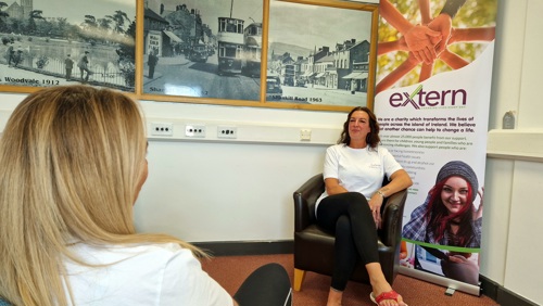 Extern staff member counselling a service user