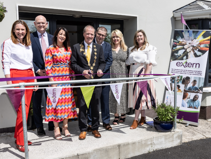 Councillor Gerald Mitchell, Mayor of the City and County of Limerick joins with Extern staff as they proudly cut the ribbon at the launch of Cratloe Respite Centre, a vital addition to community-based care in the region.