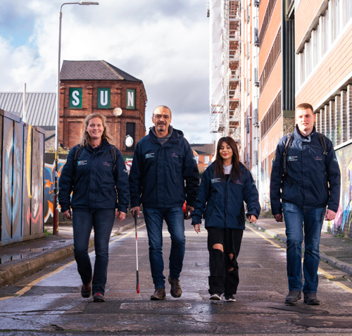 Four Extern street injector staff walking the streets of Belfast