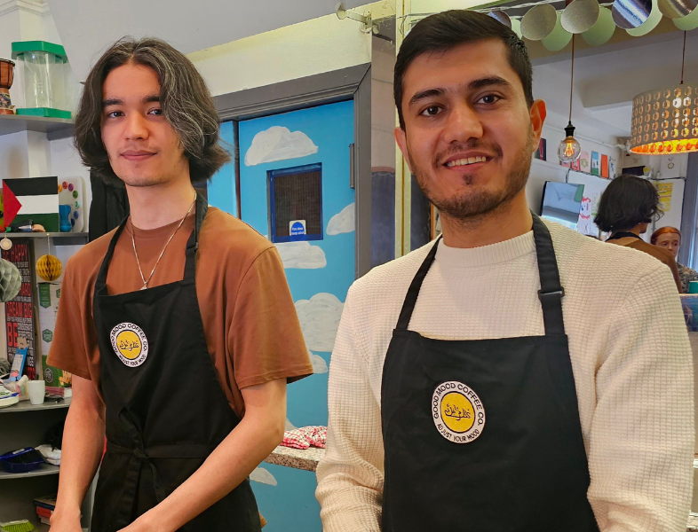 Two young male refugees taking part in the Extern Barista programme