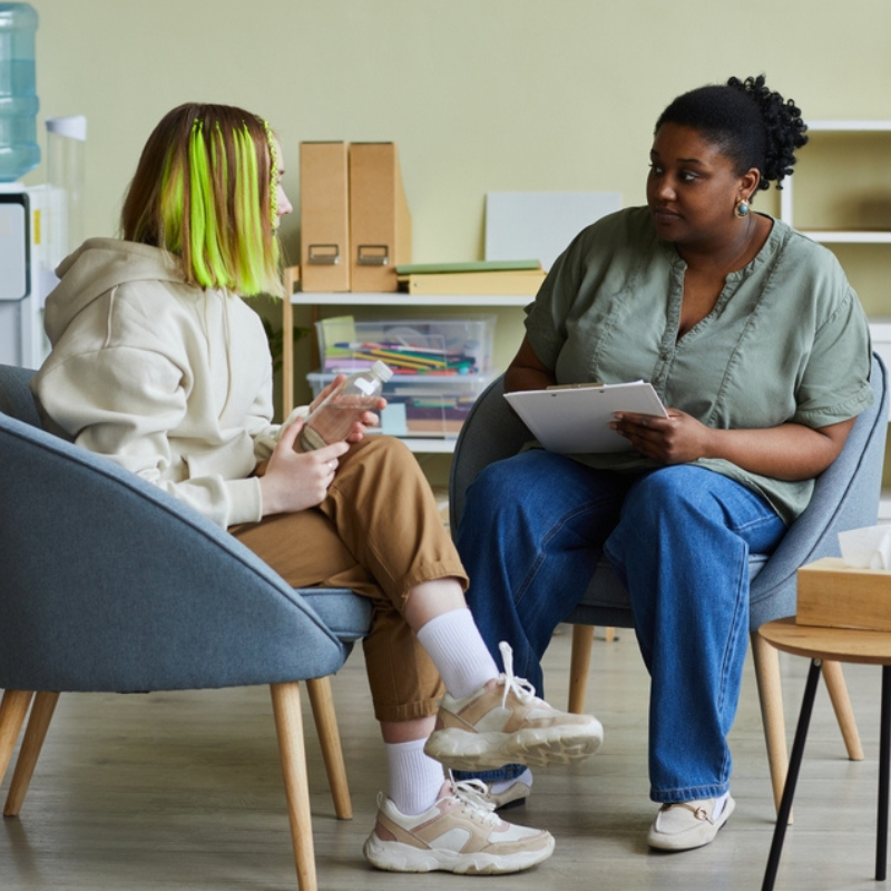 Staff talking with service user